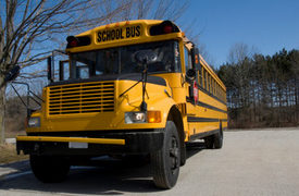 Rochester City School Bus Overturns in SUV Crash, Injures 6